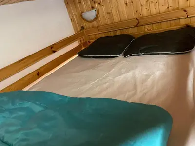 Un ou plusieurs lits dans un hébergement de l'établissement Studio cosy à La Bresse, 18 m² avec équipements