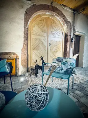 Coin salon dans l'établissement Suite Richovilare - Sauna & Hammam