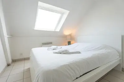 Un ou plusieurs lits dans un hébergement de l'établissement Bel appartement 4Pers Stationnement Gratuit Centre