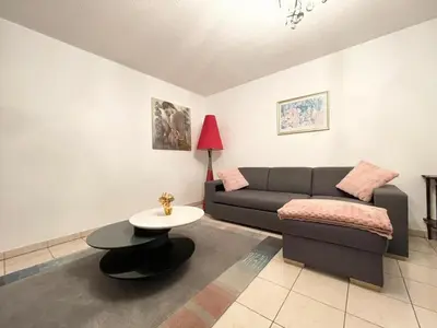 Coin salon dans l'établissement Le Fleur Magnifique Appartement Saint-Louis