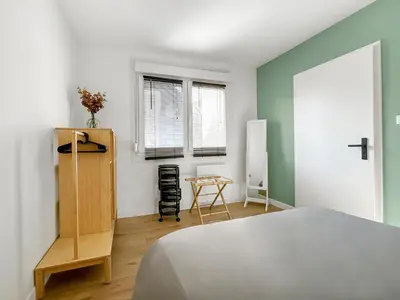 Un ou plusieurs lits dans un hébergement de l'établissement Saint-Louis - Cozy Apartment Close to Switzerland & Train Station