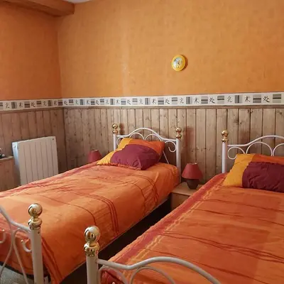Un ou plusieurs lits dans un hébergement de l'établissement appartement chez Chantal RDC 60m2 GERARDMER
