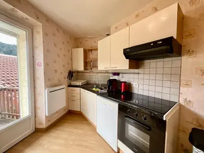 Cuisine ou kitchenette dans l'établissement Le Cresson, charmant et spacieux avec balcon