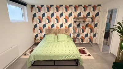 Un ou plusieurs lits dans un hébergement de l'établissement Cocon urbain , bel appartement entièrement équipé, entrée privée, parking
