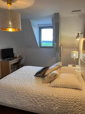 Un ou plusieurs lits dans un hébergement de l'établissement L'auberge du canal