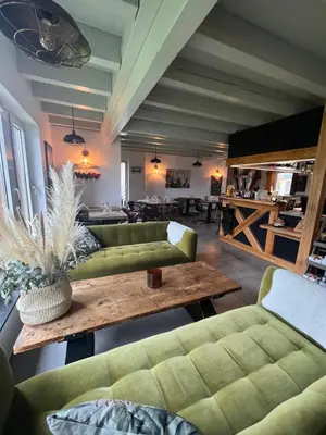 Coin salon dans l'établissement L'auberge du canal