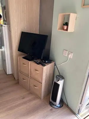 Télévision ou salle de divertissement dans l'établissement Chez Dom & Oli camping GINA PARK