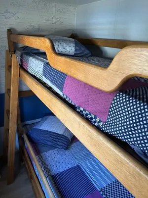 Un ou plusieurs lits superposés dans un hébergement de l'établissement Chez Dom & Oli camping GINA PARK