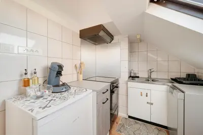 Cuisine ou kitchenette dans l'établissement Aux 4 saisons - Proche de Gérardmer