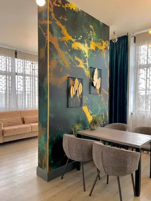 Coin salon dans l'établissement Logement Émeraude