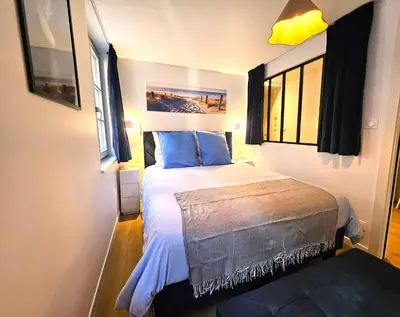 Un ou plusieurs lits dans un hébergement de l'établissement Magnifique T2-Chez François et Kamila - Centre historique- Parking privé 50m de l'appartement- balcon avec vue