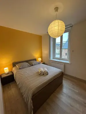 Un ou plusieurs lits dans un hébergement de l'établissement L'appart Rue Haute