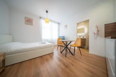 Un ou plusieurs lits dans un hébergement de l'établissement Frontiere Suites 4 Saint-Louis Proche Bale