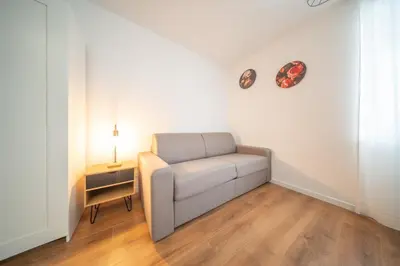 Coin salon dans l'établissement Frontiere Suites 6 Saint-Louis Proche Bale