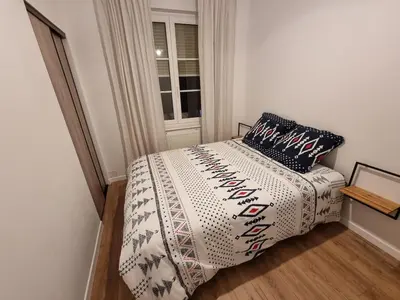 Un ou plusieurs lits dans un hébergement de l'établissement Appartement au centre historique ツ