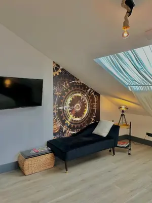 Télévision ou salle de divertissement dans l'établissement Studio Montre