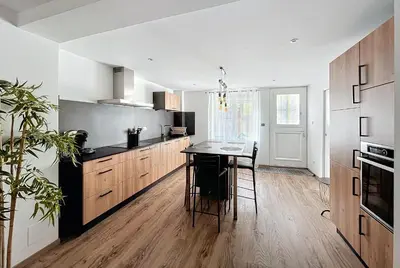 Cuisine ou kitchenette dans l'établissement Le Gite de Lisa
