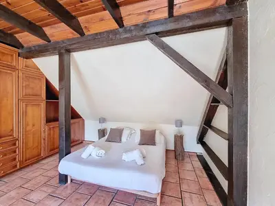 Un ou plusieurs lits dans un hébergement de l'établissement La Belle Étape, Appartement avec Piscine et Spa