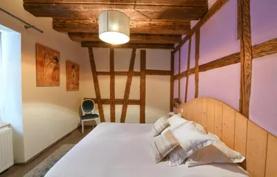 Un ou plusieurs lits dans un hébergement de l'établissement Gite de la Porte des Pucelles
