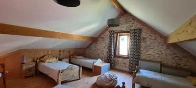 Un ou plusieurs lits dans un hébergement de l'établissement Gîte l'érable
