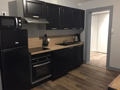 Cuisine ou kitchenette dans l'établissement Les Coteaux