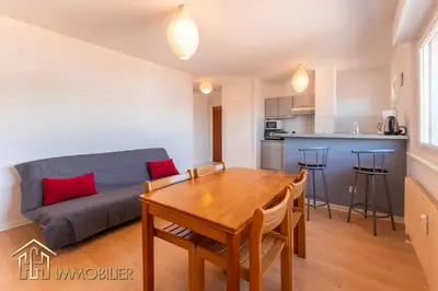 Cuisine ou kitchenette dans l'établissement Appartement L'Orient - Parking
