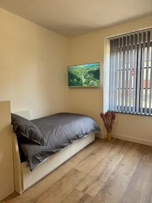 Un ou plusieurs lits dans un hébergement de l'établissement Appartement centre ville