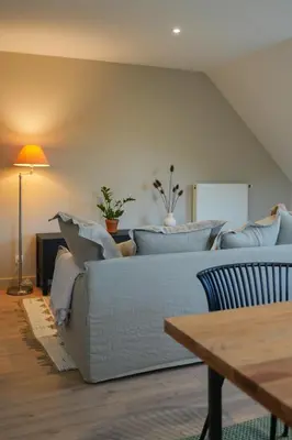 Coin salon dans l'établissement Les Hauts de Bergheim