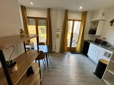 Cuisine ou kitchenette dans l'établissement Le Salon Doré Apartment