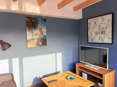Télévision ou salle de divertissement dans l'établissement Sweet Escape et Spa