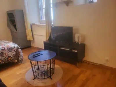 Télévision ou salle de divertissement dans l'établissement Appolon