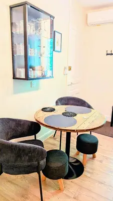 Coin salon dans l'établissement T1 Nature et Balnéothérapie