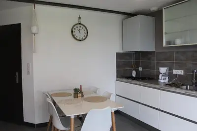 Cuisine ou kitchenette dans l'établissement Le Cosy Julian
