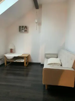 Coin salon dans l'établissement Le Cosy Julian