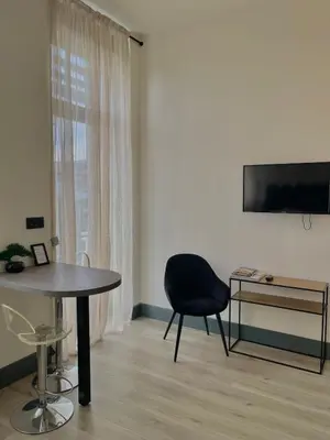 Télévision ou salle de divertissement dans l'établissement Studio Marie-Louise