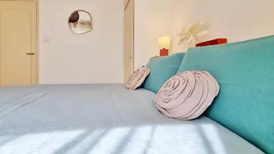 Un ou plusieurs lits dans un hébergement de l'établissement L'Escapade Colmarienne