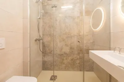 Salle de bains dans l'établissement Hôtel Terra Vinum