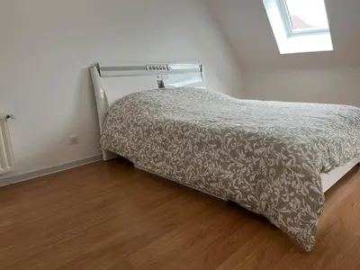 Un ou plusieurs lits dans un hébergement de l'établissement Appartement T3 Duplex centre ville