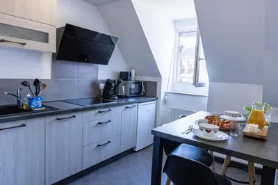 Cuisine ou kitchenette dans l'établissement Nid douillet en Alsace, pros et familles