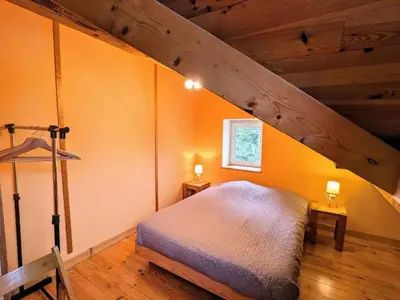 Un ou plusieurs lits dans un hébergement de l'établissement Charmante maison à Xonrupt-Longemer, 80 m² avec jardin