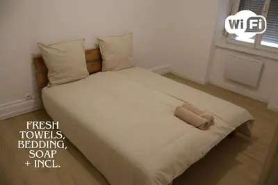 Un ou plusieurs lits dans un hébergement de l'établissement Step-Free Cozy Nest in Mulhouse