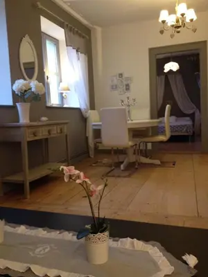 Coin salon dans l'établissement Gite Des 3 Chateaux