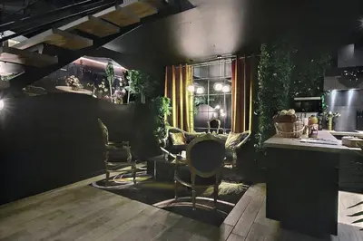 Coin salon dans l'établissement Sanctuaire d'Aphrodite Piscine cinéma & spa