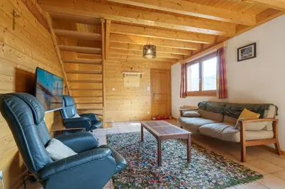 Coin salon dans l'établissement Chalet Le Bas du Paradis