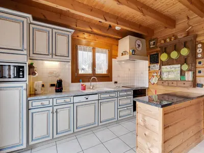 Cuisine ou kitchenette dans l'établissement Nature Chalet in Abbévillers