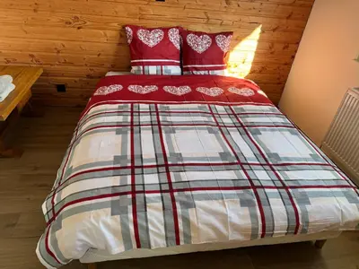 Un ou plusieurs lits dans un hébergement de l'établissement Chambre Hiver