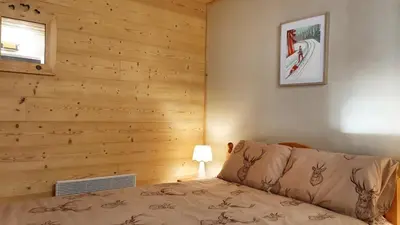 Un ou plusieurs lits dans un hébergement de l'établissement La Belle Vue Gérardmer