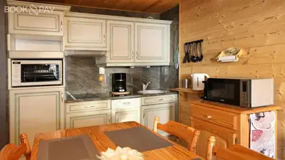 Cuisine ou kitchenette dans l'établissement La Belle Vue Gérardmer