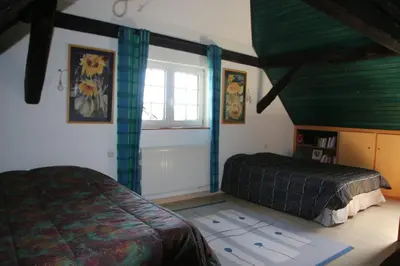 Un ou plusieurs lits dans un hébergement de l'établissement Gîte des Chamois