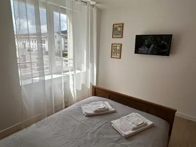 Un ou plusieurs lits dans un hébergement de l'établissement La Jonquille, Appartement Centre Ville de Gérardmer, linge et ménage inclus